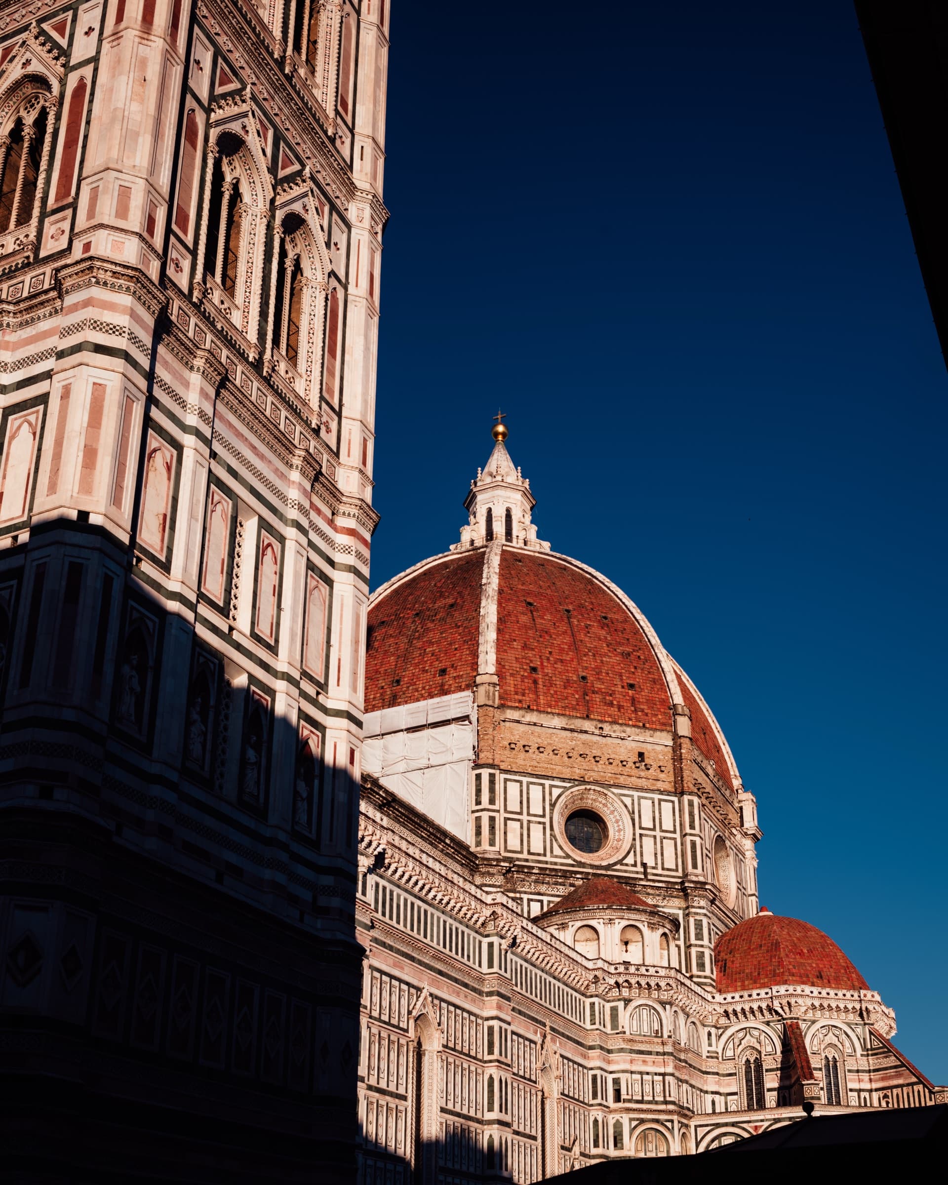 Brunelleschi's dome and Giotto's bell tower on Florence's Duomo, seen from Piazza del Duomo