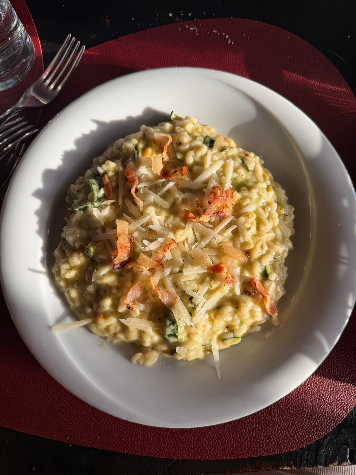 Vegetable and zucchini risotto with shaved cheese